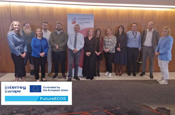 Group photo with logo 1 600 395 66 c1